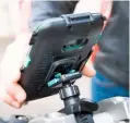  ??  ?? Phone mount’s smart no-tools design fits on a handlebar in seconds