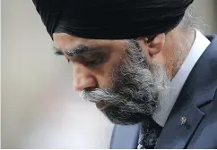  ?? ADRIAN WYLD / THE CANADIAN PRESS ?? Defence Minister Harjit Sajjan bows his head during question period Tuesday in the House of Commons.