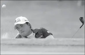  ?? AP/CARLOS OSORIO ?? South Korean Inbee Park hits from the sand on the 15th hole during the third round of the Meijer LPGA Classic on Saturday at Blythefiel­d Country Club in Belmont, Mich.