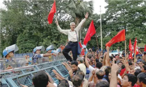  ?? — Reuters ?? Activists of Center of Indian Trade Unions protest in Kolkata against the hike in fuel prices and various other issues.