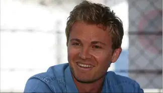  ?? (Photo Cyril Dodergny) ?? Nico Rosberg lors de la séance de dédicaces en .