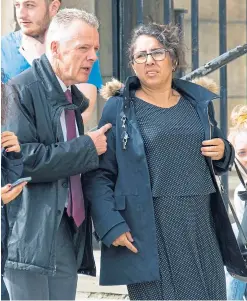  ??  ?? Andrew Greenlees leaves court with his wife Lilian.