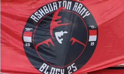  ?? Jacques Feeney/Offside/Getty Images ?? The Ashburton Army ultras wave flags during the Premier League match between Arsenal and Aston Villa in August 2022 Photograph: