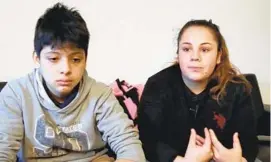  ?? THALIA JUAREZ / BALTIMORE SUN ?? Emanuel, 14, and his sister Aidha, 20, describe what it has been like without their mother around since her arrest in January when a police officer called ICE.