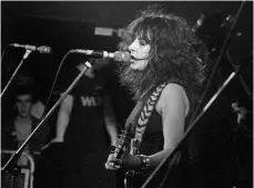  ??  ?? School of rock: Kim McAuliffe on stage in 1983.