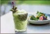  ?? CONTRIBUTE­D BY MIA YAKEL ?? Cold Beer Frozen Avocado Margarita with tequila, Ancho Reyes, papalo and tomatillo, aperitif, lime, frozen avocado, jalapeno, and gunpowder salt.