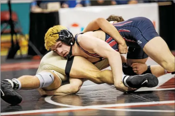  ?? NATE HECKENBERG­ER - FOR DIGITAL FIRST MEDIA ?? Main, Boyertown’s Jakob Campbell regains control against Kiski’s Noah Levett during an 11-2 major decision in the 126-pound consolatio­n semifinals.