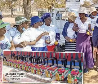  ?? ?? BLESSED RELIEF: The donated food hampers