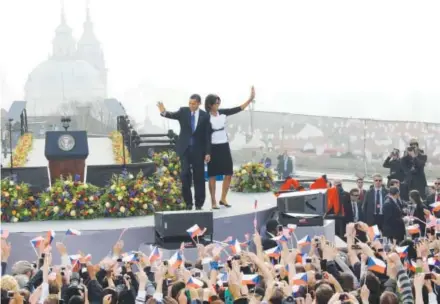  ?? Herbert Knosowski, Associated Press file ?? President Barack Obama and first lady Michelle Obama greet the crowd prior to his speech in front of the Castle in Prague, Czech Republic, on April 5, 2009.