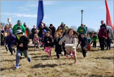  ?? ZACHARY SRNIS — THE MORNING JOURNAL ?? Children race to get first place Sunday at Mercy Health Amherst Healthplex at 47160 Hollstein Drive in Amherst.