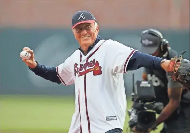  ?? AP-USA Today Sports — Brett Davis ?? Atlanta Braves former pitcher Phil Niekro throws out a ceremonial first pitch before Game 5 of the 2019 NLDS playoff baseball series against the St. Louis Cardinals at SunTrust Park.