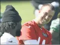  ?? Bill Kostroun ?? FITTING IN:New Jets QB Trevor Siemian shares a laugh at practice Wednesday.