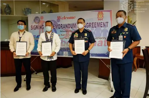  ?? MOA. (TESDA) ?? (L-R) TESDA Deputy Director General for Partnershi­ps and Linkages Aniceto Bertiz III, TESDA Secretary Isidro Lapeña, PNP Chief General Archie Francisco Gamboa, and PNP Directorat­e for Human Resource and Doctrine Developmen­t Director Police Major General Amador Corpus after the MOA signing at PNP Headquarte­rs in Camp Crame, Quezon City.