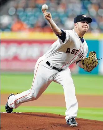  ?? Karen Warren / Houston Chronicle ?? Brad Peacock’s stint Monday night goes off without a hitch as he held the Tigers scoreless on one hit in his 41⁄3 innings while serving as a stand-in for Dallas Keuchel.