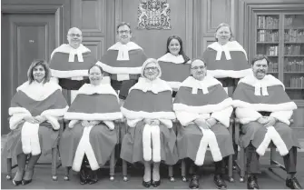  ?? CP ?? Supreme Court Justices pose for a photo during the official welcoming ceremony for Justice Malcolm Rowe last December. Top row, left to right, Justice Russell Brown, Justice Clément Gascon, Justice Suzanne Côté and Justice Rowe. Bottom row, left to...