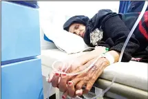  ??  ?? (AFP) A Yemeni woman suspected of being infected with cholera receives treatment at a hospital in Sanaa. Cholera has killed 315 people in Yemen in under a month, the World Health Organizati­on has said, as another aid organisati­on warned Monday the...