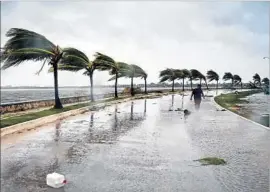  ?? Adalberto Roque AFP/Getty Images ?? HEAVY WINDS continue to blast Caibarien, Cuba, after the passage of Hurricane Irma. The storm made landfall on the island as a Category 5.