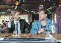  ?? DANIEL MCFADDEN/WARNER BROS. ?? Ryan Gosling, left, and Russell Crowe star in The Nice Guys, which has a bar scene that evokes a Dickensian spirit.