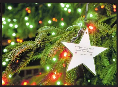  ??  ?? MESSAGE OF HOPE: The Church has distribute­d 750 of these stars around a social housing estate