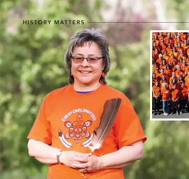  ??  ?? Left: Phyllis Webstad, author of The Orange
Shirt Story, wears a 2019 Orange Shirt Day T-shirt, designed by Vinita Rathod, a grade twelve student from Richmond, B.C.