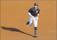  ?? Kathy Willens / Associated Press ?? The New York Yankees’ Aaron Judge round the bases after hitting a solo home run off James Paxton during an intrasquad game Wednesday at Yankee Stadium.