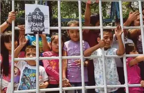  ?? AFP PIC ?? Children joining a protest against American immigratio­n policies outside the US embassy in Mexico City on Tuesday.