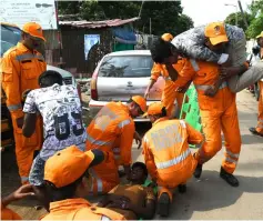  ??  ?? Members of India’s State Disaster Response Force take part in a tsunami response training exercise in Chennai, India.