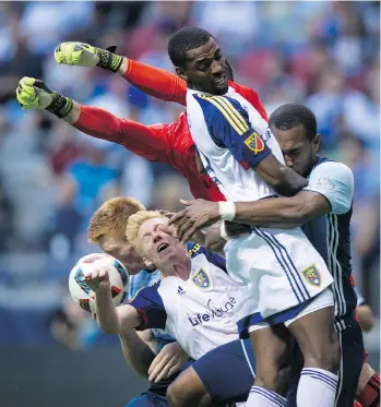  ?? THE CANADIAN PRESS FILES ?? Whitecaps Tim Parker, back left, and Kendall Waston, front right, have displayed a cohesivene­ss that wasn’t there last season, and the result is backfield that gives Vancouver a chance every night.