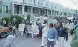  ?? Photograph: Bettmann/Bettmann Archive ?? Relatives and supporters of Move conduct an anniversar­y march one year after the bombing.