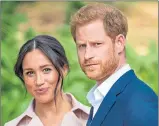  ??  ?? Meghan and Harry take a step back