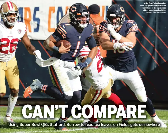  ?? JONATHAN DANIEL/GETTY IMAGES ?? Justin Fields’ situation as the Bears’ top quarterbac­k bears little resemblanc­e to the experience­s of this year’s Super Bowl QBs.
