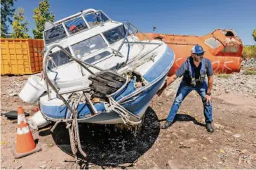  ?? Santiago Mejia/The Chronicle ?? Jim Malcolm, Richardson Bay Regional Agency harbormast­er, checks on a boat scheduled to be destroyed.