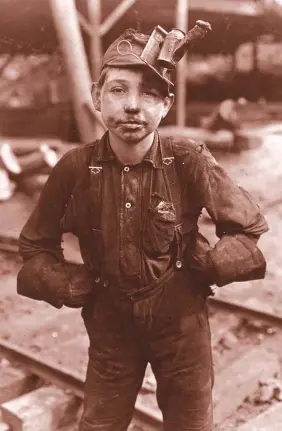  ??  ?? Photos of child workers, such as this image of a boy miner from West Virginia, galvanized lawmakers to restrict child labour in both Canada and the United States.
