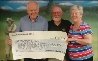  ??  ?? Noel Heeney (left) and Ann Short receives the cheque from Greenhills chairman Jack Howell.