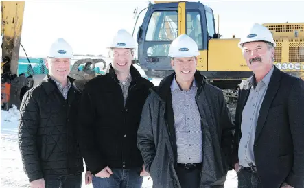  ?? WIL ANDRUSCHAK ?? Standing on the future land for Yorkville are, from Mattamy Homes, from left, Warren Saunders, vice-president of sales and marketing, Collin Campbell, vice-president operations, Don Barrineau, division president and Peter Lewandowsk­i, vice-president of...