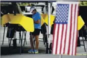  ?? MARCIO JOSE SANCHEZ — THE ASSOCIATED PRESS FILE ?? Arjan Walia votes during a special election in Santa Clarita.