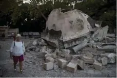  ?? PETROS GIANNAKOUR­IS/THE ASSOCIATED PRESS ?? Several structures were damaged after two tremors hit Kos, Greece.