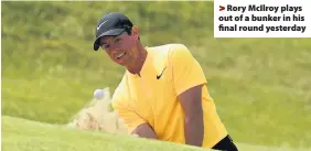  ??  ?? > Rory McIlroy plays out of a bunker in his final round yesterday