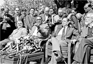  ??  ?? (From left) Justices Kurian Joseph, Chelameswa­r, Ranjan Gogoi and Madan Lokur address the media at a news conference in New Delhi. — Reuters photo