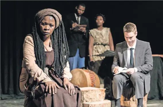  ??  ?? Troublemak­er: Faniswa Yisa plays Tseliso, the central character in Nwabisa Plaatjie’s adaptation of the 1983 play The Native Who Caused All the Trouble, supported by Kai Luke Brummer (seated) and Nomakrestu Xakathugag­a