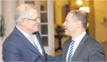  ?? Photo / AP ?? Treasurer Josh Frydenberg (right) with new Prime Minister Scott Morrison.