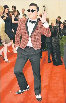  ??  ?? In this file photo dated May 6, 2013 shows Psy attending the Costume Institute Benefit at The Metropolit­an Museum of Art. Psy, who set off a global sensation with ‘Gangnam Style’, tried out a fresh sound June 8 as he released a hip-hop tale of drunken...