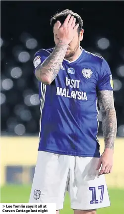  ??  ?? > Lee Tomlin says it all at Craven Cottage last night