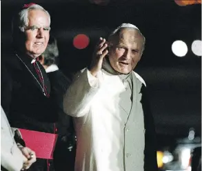  ??  ?? Archbishop Joseph MacNeil, left, accompanie­s Pope John Paul II at Namao Airport in 1987. MacNeil died Sunday. He was 93.