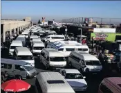  ?? PHOTO: REUTERS ?? Minibus taxis, mostly Toyota-made, at Baragwanat­h, the biggest taxi rank in Soweto. Protest action will continue.