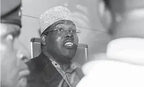  ??  ?? KENYAN OPPOSITION POLITICIAN MIGUNA MIGUNA SAYS HE HAS BEEN DETAINED AT NAIROBI’S INTERNATIO­NAL AIRPORT AFTER TRYING TO RETURN TO THE COUNTRY. (PHOTO: THE Guardian)