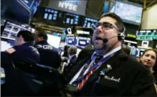  ?? RICHARD DREW — THE ASSOCIATED PRESS ?? Trader Michael Capolino works on the floor of the New York Stock Exchange, Thursday.