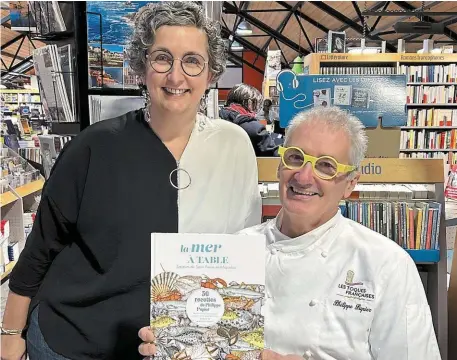  ?? | PHOTO : OUEST-FRANCE ?? L’ouvrage « La mer à table », de Philippe Pupier et Caroline Dujardin, a été primé, en novembre, aux Gourmand World Cookbook Awards, comme l’un des meilleurs livres de cuisine au monde.