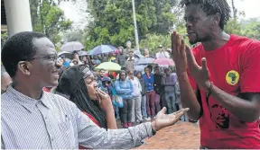  ?? Picture: Daylin Paul ?? Rhodes vice-chancellor Sizwe Mabizela, left, has his hands full dealing with students’ grievances.