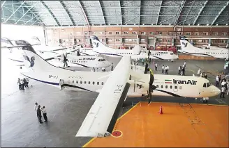  ??  ?? In this photo provided by Tasnim News Agency, Iran Air’s new commercial aircrafts are parked at Mehrabad Airport in Tehran, Iran on Aug 5. Iran has acquired five new ATR72-600 airplanes from ATR, jointly owned by European consortium Airbus and Italy’s Leonardo, a day before the US begins restoring sanctions suspended under the 2015 nuclear deal. (AP)